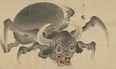 29 Ushi-oni (うし鬼) is a yōkai in traditional Japanese folklore, and its name is translated as "ox demon". The ushi-oni mostly resides near bodies of water, and it is known for attacking and terrorizing people. The appearance of the ushi-oni may vary depending on legend or region of habitat, but it most commonly has the head of an ox with some oni-like attributes, sharp horns curving upward, and sharp fangs. The body is most commonly depicted as spider-like with six legs, each ending with long singular claws. Though tales of the ushi-oni's terrors vary, it is commonly characterized by tenacity, ferocity, and a carnivorous diet which includes humans. The Ushi-oni also cooperates with Nure-onna (ぬれ女) or Iso-onna (磯女) to secure its prey.
