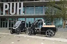 Quadricycles combining muscle power and an electric motor