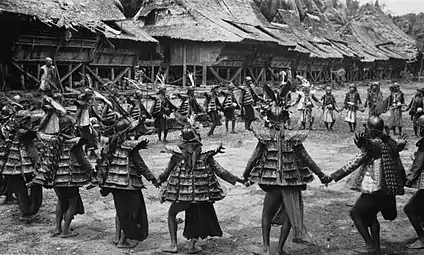 Warriors in Bawodobara performing war dance