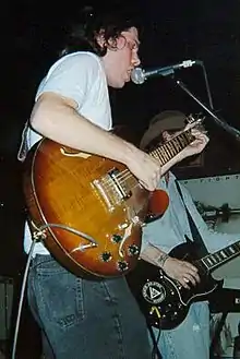 Dax Riggs (foreground) and Mike Sanchez performing at Shanahan's in Lafayette, Louisiana
