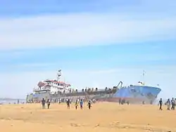 A dredger ship washed up on the Mundakkal beach