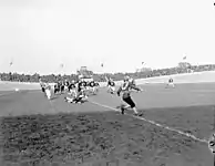 Image 28A game between the 4th Canadian Armoured Division Atoms and First Canadian Army Red and Blue Bombers, in Utrecht, Netherlands, October 1945 (from Canadian football)