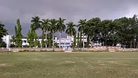 Garbalia Rakhal Chandra Manna Institution's playground, with Garbalia Rakhal Chandra Manna Institution in the background
