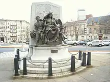 Three bronze figures