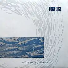 A blue and grey cover depicting a school of fish.