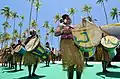 Tifa drum being played with a suling flute (center) in a Suling Tambur (flute-drum) combination in the Raja Ampat Islands.