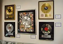 Image 28Platinum records by Elvis Presley, Prince, Madonna, Lynyrd Skynyrd, and Bruce Springsteen, at Julien's Auctions (from Album era)