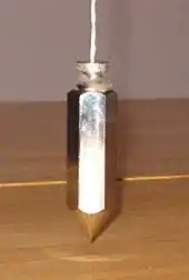 Image 17A plumb bob determines the local vertical direction (from Gravity of Earth)