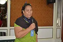 Pulafagu Toafa holds a microphone