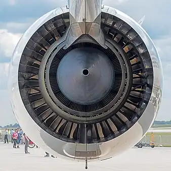 Turbofan (Trent) showing core nozzle and turbine blades, and bypass nozzle and fan bypass stators. The two nozzle wakes are made up of the waste which goes with thrust production. Both have residual velocity loss from their kinetic energy which is accounted for by pr eff. The core has heat rejected from the thermodynamic cycle and component losses. Also from the core part of the propulsion system, i.e. the nozzle and the LPT losses associated with the fan bypass flow. The fan nozzle passes the heat losses from the bypass propulsion system, i.e. the fan outer entropy generation, entropy production from the bypass duct pressure loss and the nozzle.