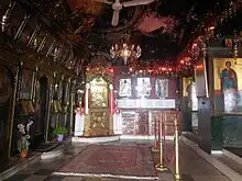 The inside of the Church of Panagia Trypiti in the rock. (The holy icon of Panagia is visible in the background)