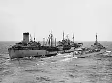 USS Manatee refueling HMAS Warramunga off Korea, 27 June 1951.