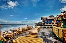 Image 47Cox's Bazar in Bangladesh known for its wide sandy beach, is believed to be the world's longest (120 km) natural sandy sea beach. It is located 152 km south of Chittagong. The photo features a beach restaurant at Cox's Bazar.Photo Credit: Xalan mustafa